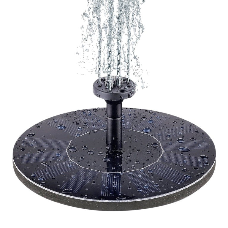 Solar fountain pump floating in bird bath with water spraying upward, 1.4W solar powered, no wiring required